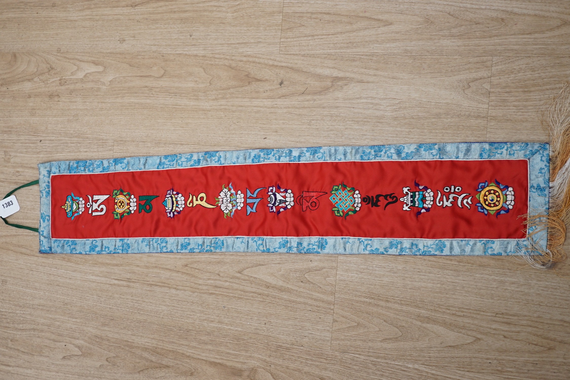 Three Chinese embroideries, including a Buddhist hanging